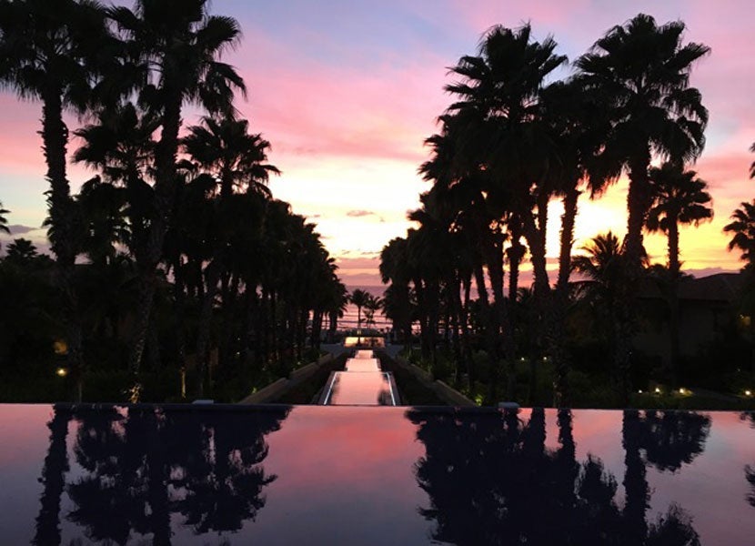 This stunning vista and a cold beverage greet guests who arrive around sunset.