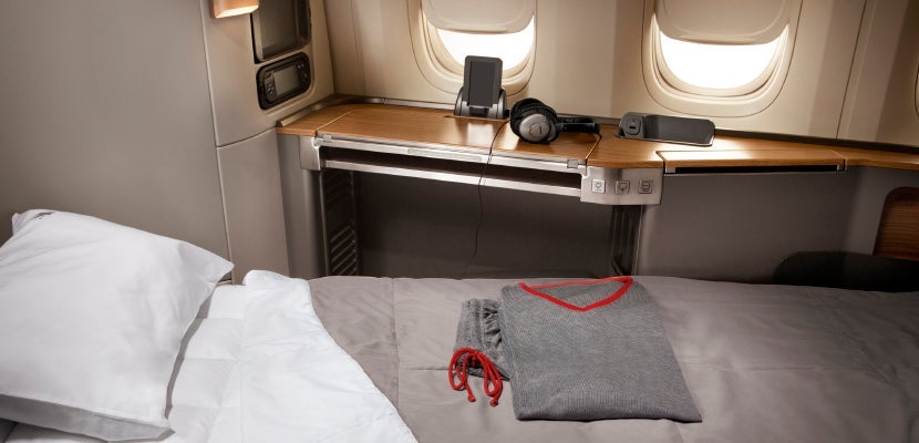 You'll earn actual miles flown plus a 50% bonus for flights in American first class.