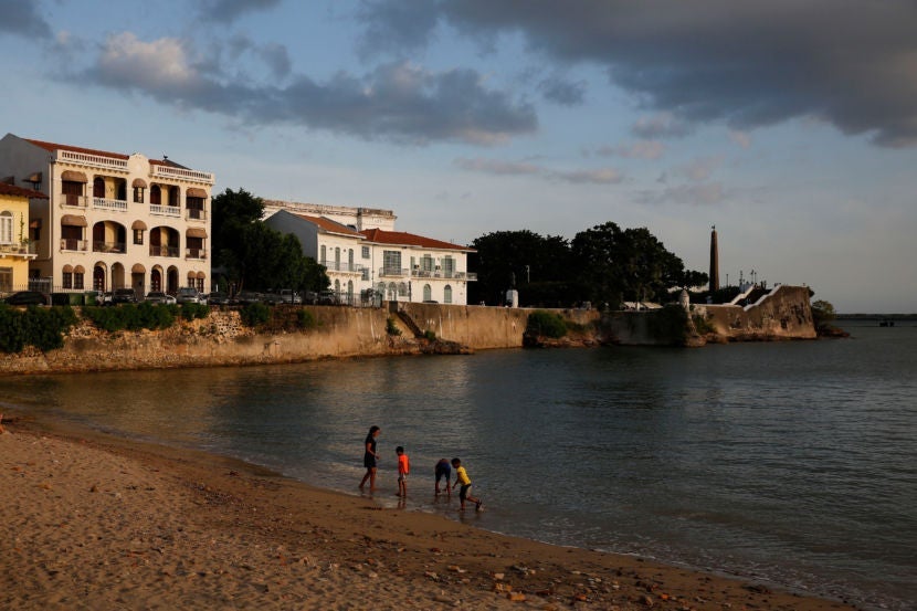Children play on the beach.