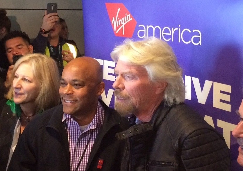 Sir Richard Branson, Mayor Michael Hancock, and Kim Day, director of Denver International Airport.