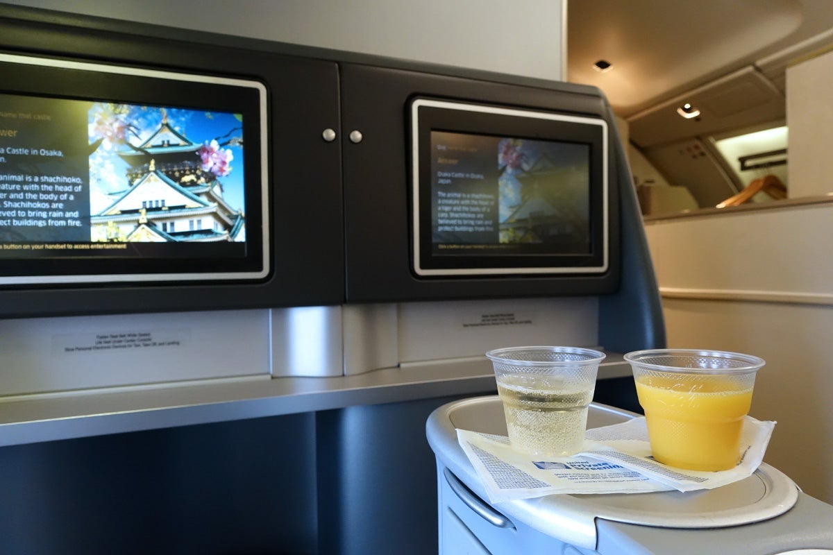 A flight attendant offered drinks prior to departure.