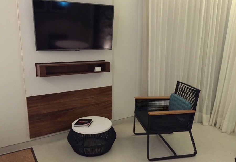 The awkwardly placed seating area and TV.