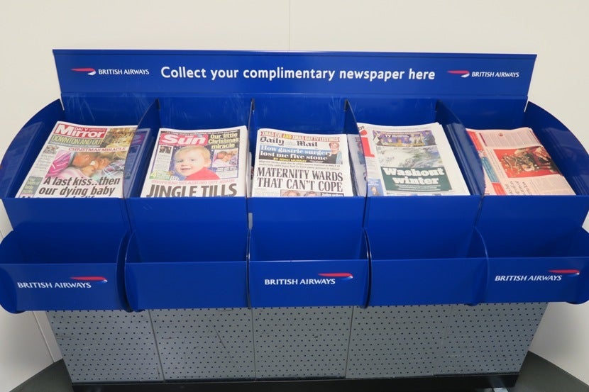 Need something to read on this flight? Complimentary newspapers were available to all on the jetway.