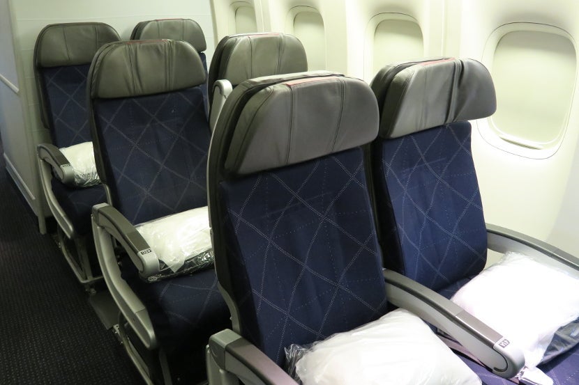 In the 3-4-3 economy cabin, the few pairs of seats in the back of the cabin can be perfect for couples.