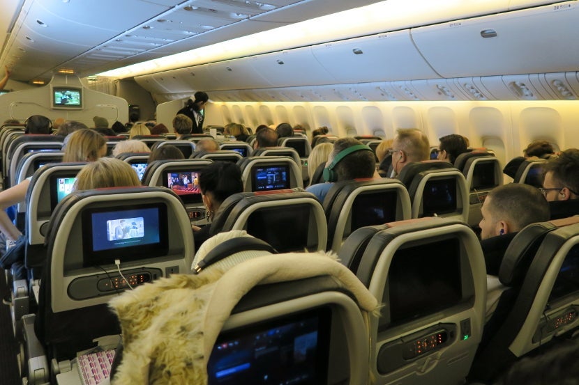 The flight attendants passed through the cabin frequently, but were not very friendly.