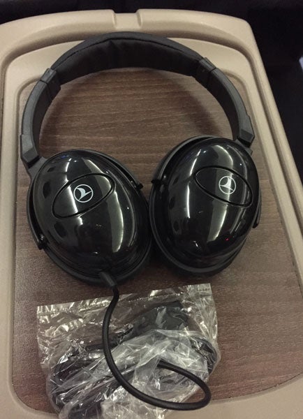 The noise-canceling headsets given out to business-class passengers.