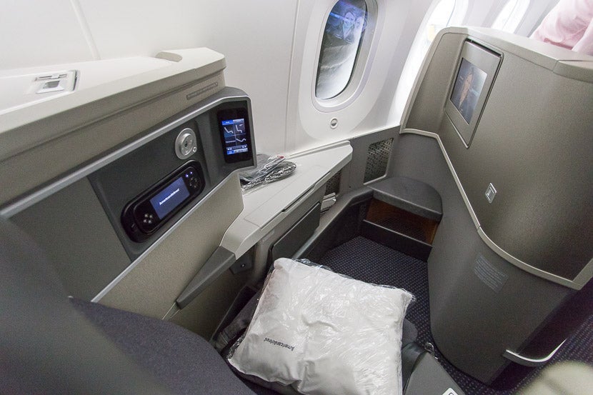 While these seats are a little less private than reverse-herringbone seats, your feet area isn't under the seat in front of you, so it feels more open.