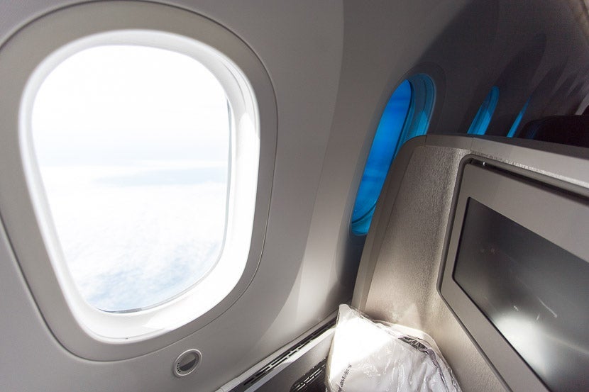The Dreamliner's electronic windows get dark, but not quite dark enough — here's the contrast between a fully-transparent window and fully-darkened window.