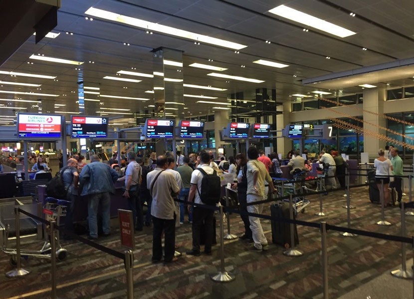 The Turkish Airlines check-in row at SIN's Terminal 1.