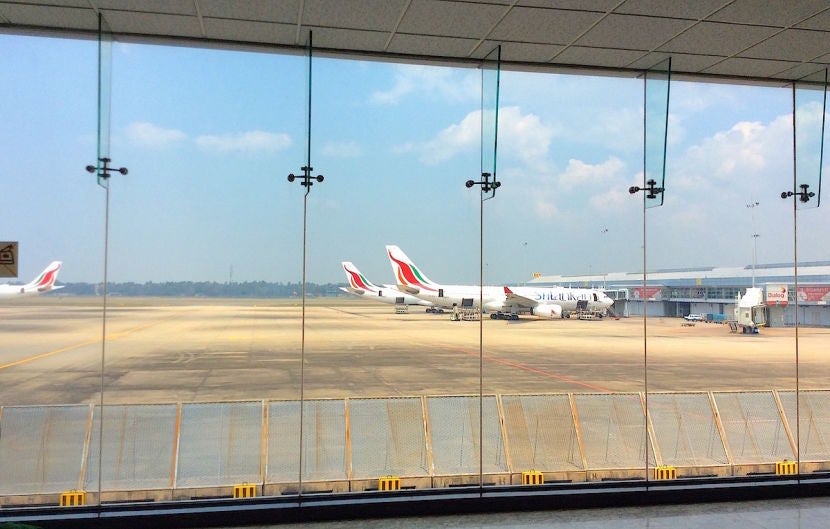 Checking out the planes on the tarmac at Colombo.