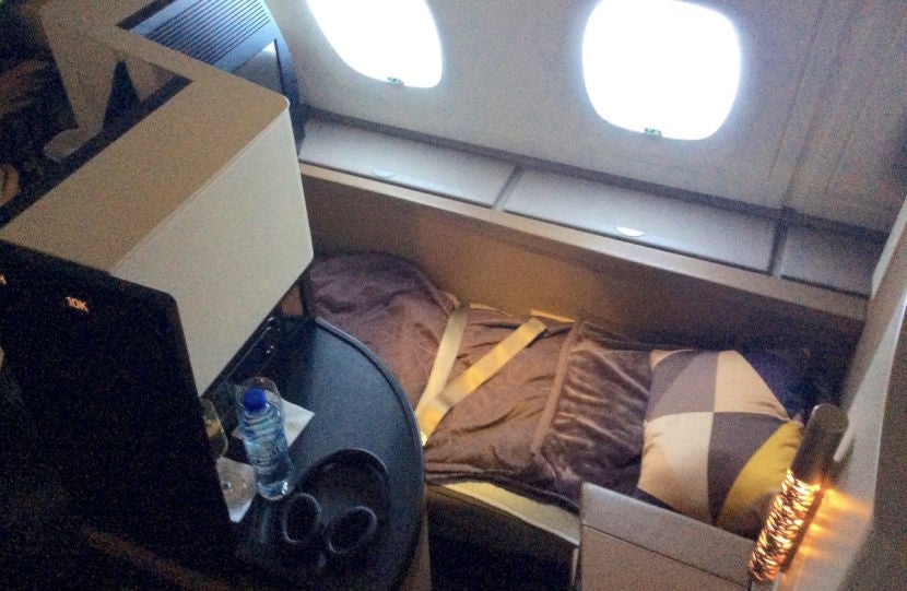 My seat in the lie-flat bed position.