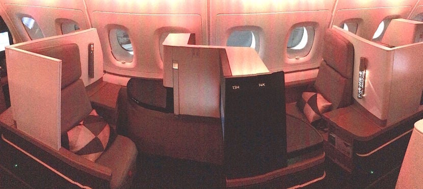 A panorama of front-rear facing seats on the side.