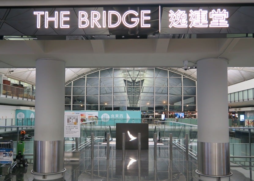 Rather ironically, you have to head down escalators from the terminal floor to reach "The Bridge" lounge.