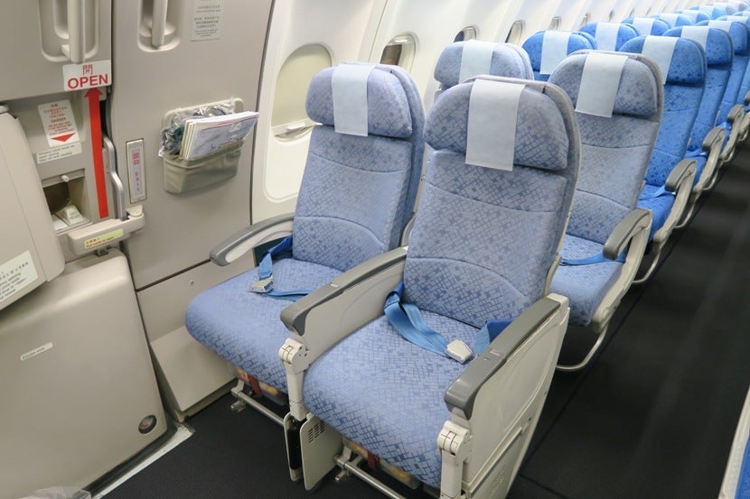 While you may be tempted by the exit row, be wary that this area was a crowded part of the plane at cruising altitude.