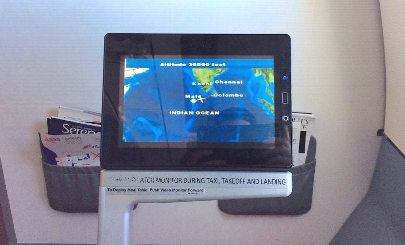 In the bulkhead, you have to stow your screens for takeoff and landing.