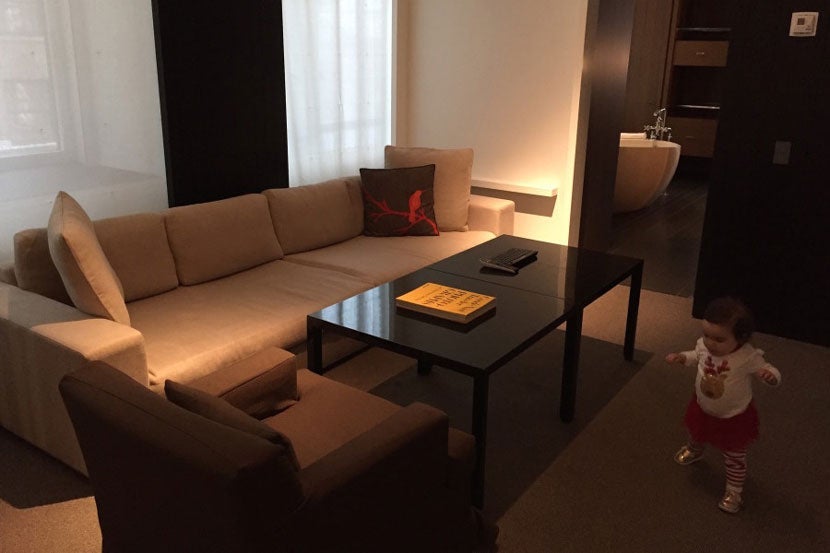 Evy had a great time checking out the living room area.