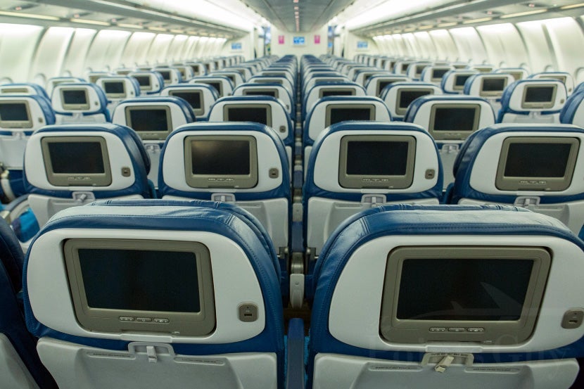 Economy seats offer on-demand in-flight entertainment.