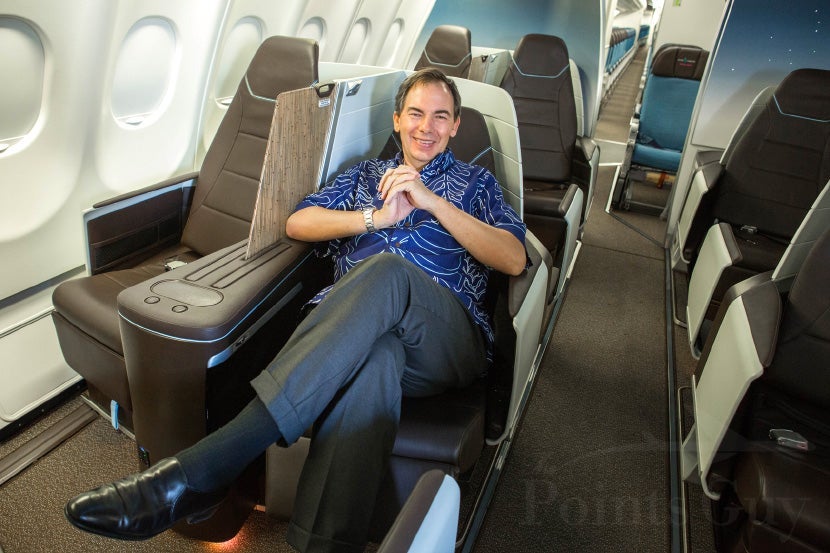 Hawaiian Air CEO Mark B. Dunkerley in the airline's new business-class cabin.