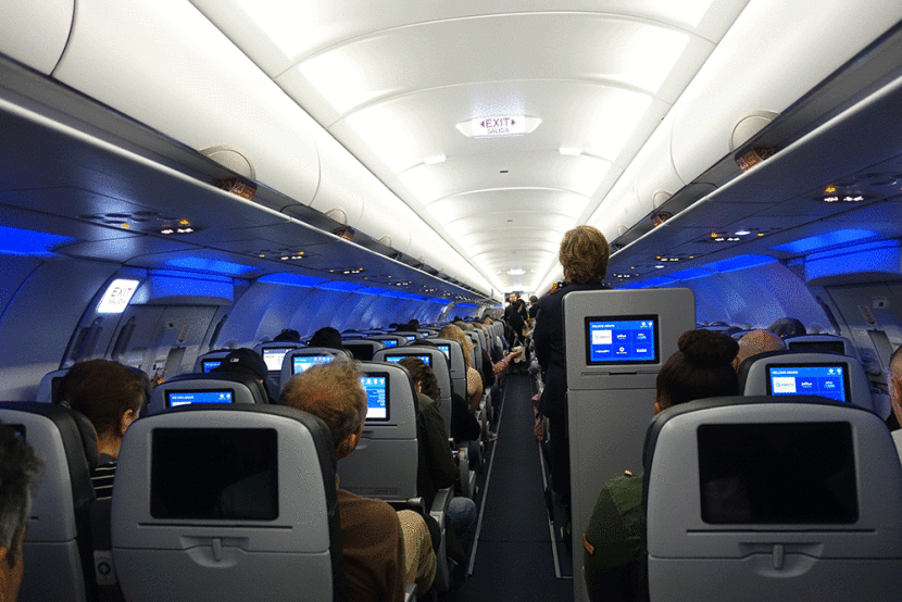 A peek at the unusual jump seat in row 22 (exit row).