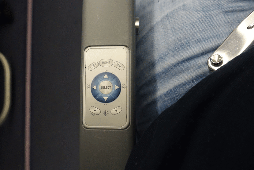 The remote built into the armrest was an annoyance during the flight.
