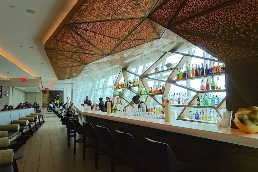 A shot of the bar, which is just beyond a sitting area at the entrance.