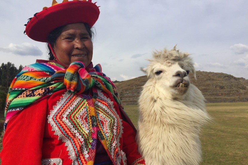 A local woman and her llama at Sacsayhuaman.
