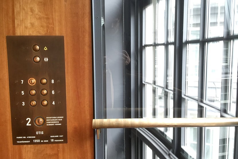 You'll take the elevator to the second floor for check-in.