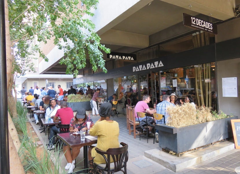 Enjoy people watching and delicious local fare at Pata Pata in Maboneng.