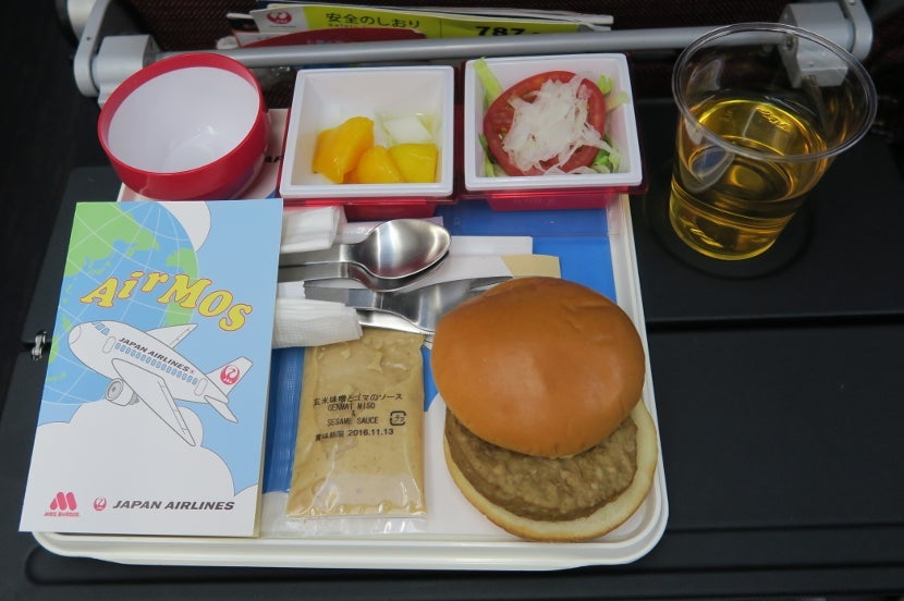 The arrival meal was a warm MOS burger — complete with instructions on how to eat the burger.
