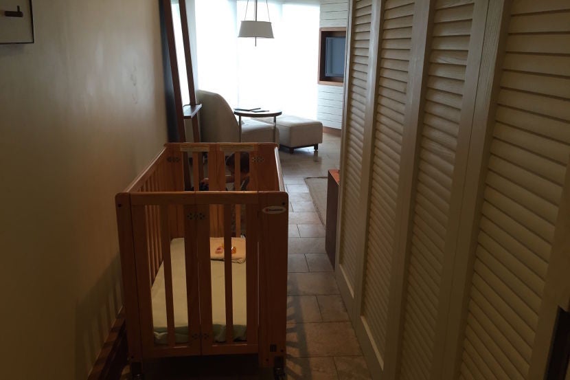 The crib made the room's hallway seem even narrower.