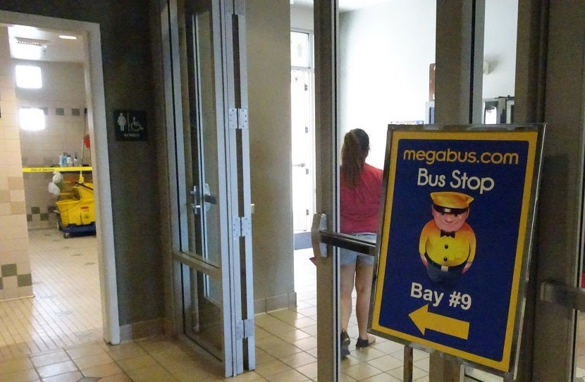 This way to the bus... or perhaps to the women's restroom.