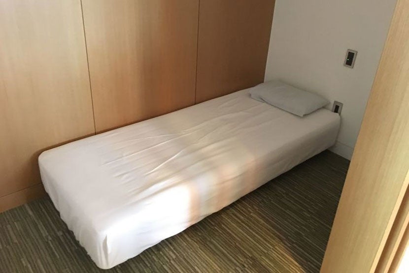 JAL has several nap rooms in the lounge.