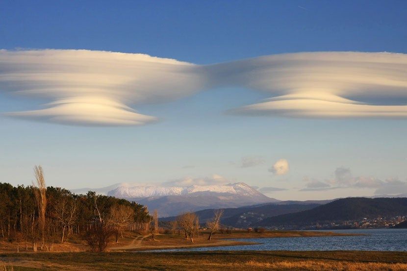 Standing Lenticular clouds, which can often indicate areas of mountain waves. Image courtesy of <a href="http://www.shutterstock.com/pic-109452947/stock-photo-lenticular-clouds.html?src=9om4HidtjxtBX1Z4LxT1yQ-1-3" target="_blank">Shutterstock</a>.