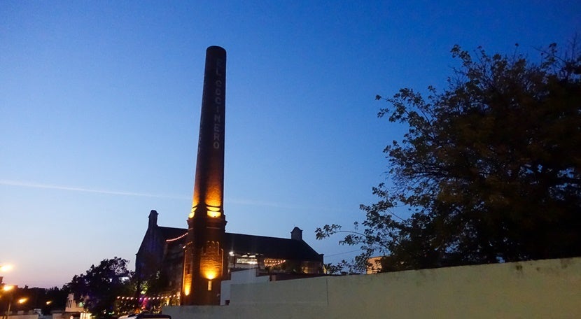 El Cocinero and its signature smokestack,dating back to its days as a factory.