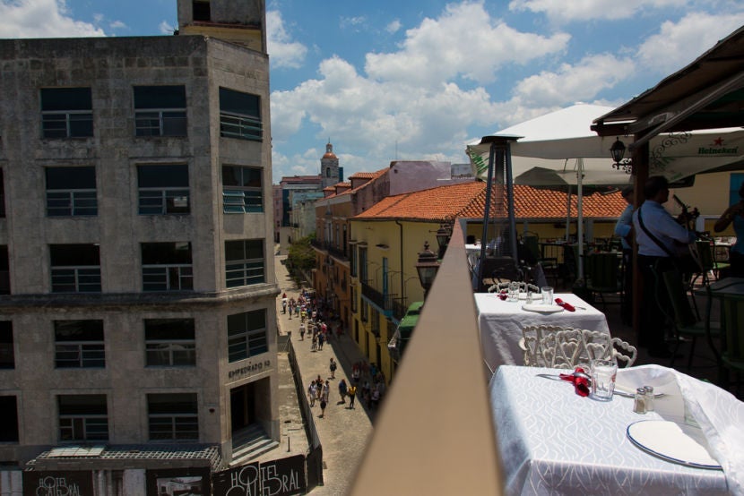 Check out the rooftops of Old Havana from La Moneda while enjoying live music.