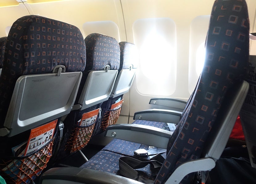 Gray-and-orange seats must mean we're sitting in EasyJet seats.
