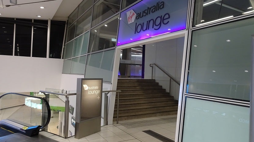 If you're catching a flight in the domestic terminal at Sydney Airport, you're sure to notice signs to the Virgin Australia lounge.