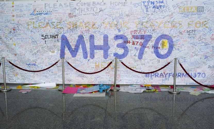 The search for MH370 will soon be suspended indefinitely. Image courtesy of <a href="http://www.shutterstock.com/pic-182049074/stock-photo-kuala-lumpur-international-airport-march-support-messages-and-prayers-for-malaysia.html?src=f6tchrbcwdXptCAr-xGkKg-1-3" target="_blank">Shutterstock</a>.