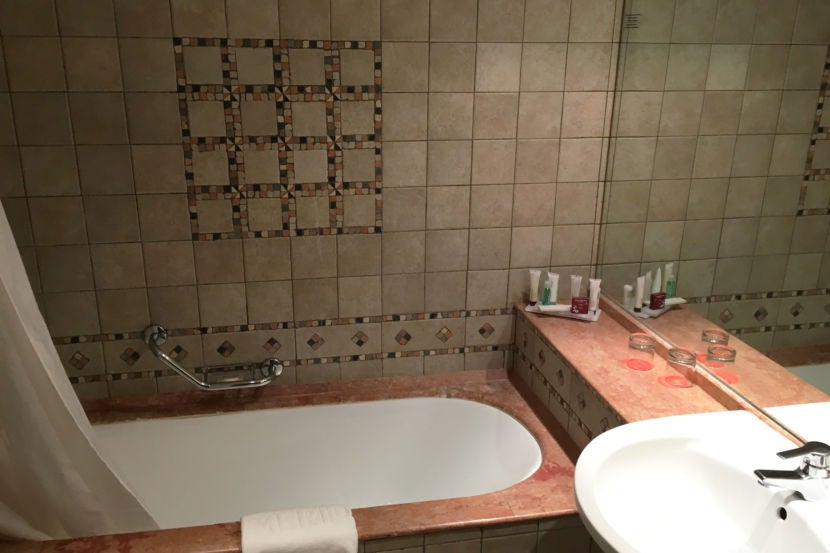 The bathroom featured very nice tiles.