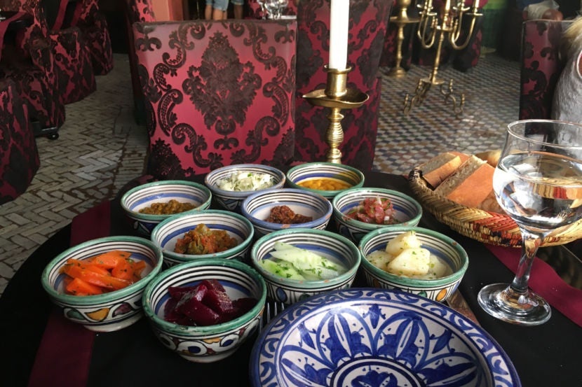 Tasting traditional Moroccan salad in Marrakesh.