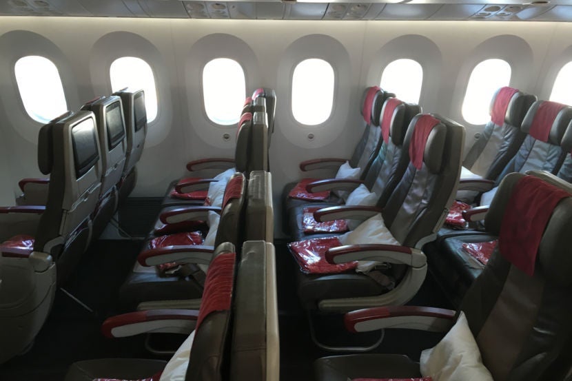 Each seat has personal entertainment.