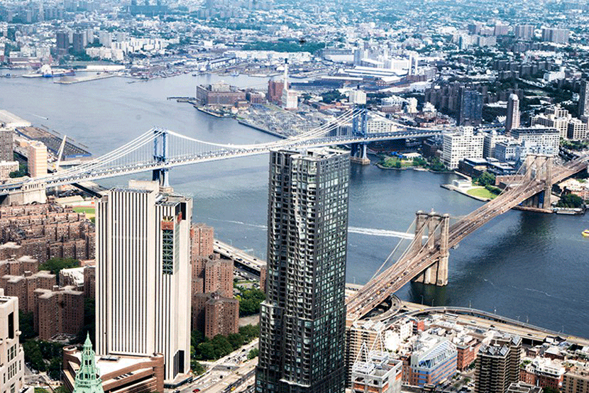 The Manhattan and Brooklyn Bridges, as seen from One World Trade Center. Image by Kofi Lee-Berman.