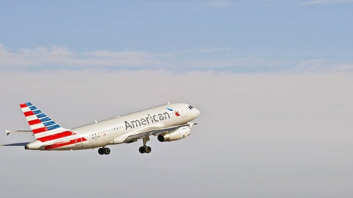 American Airlines Plane in Flight-Image Courtesy of Shutterstock