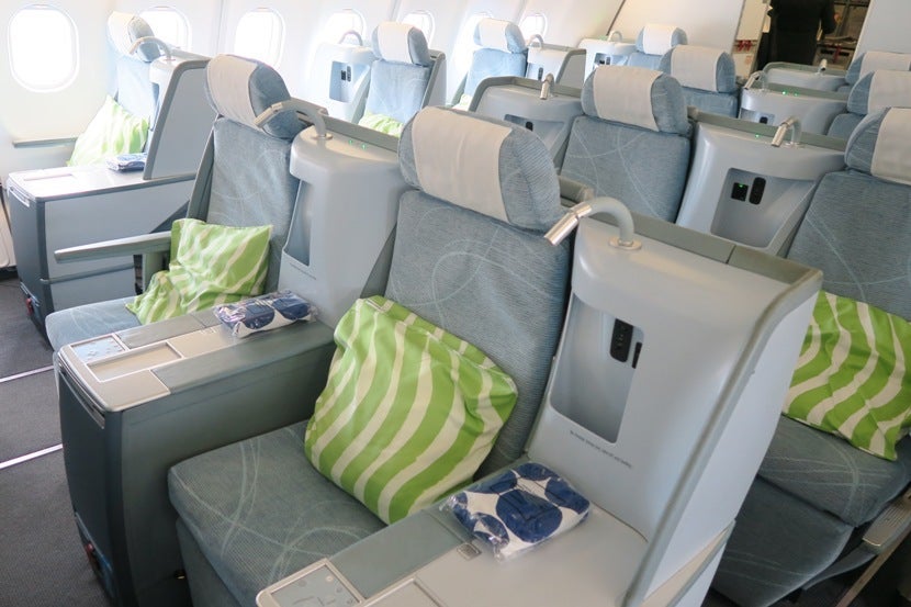 The middle seats are in arranged as staggered two-seat rows.