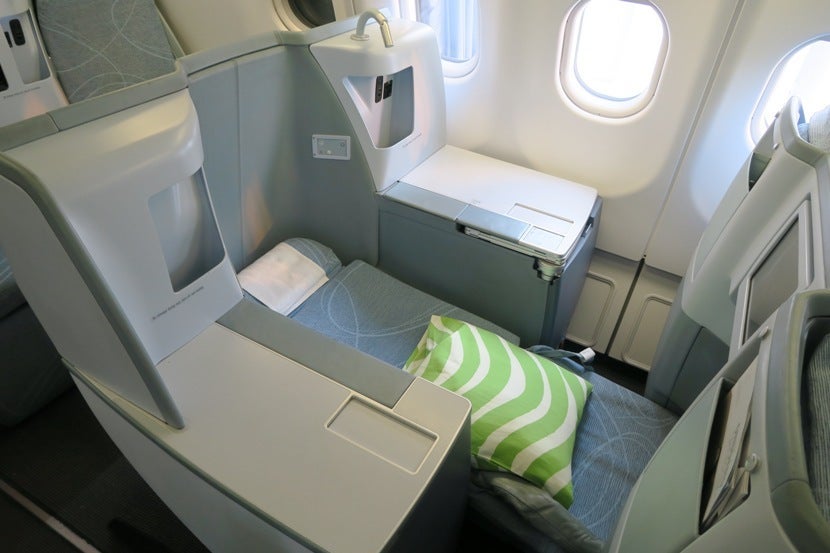 Each business class seat reclines into a lie-flat bed.