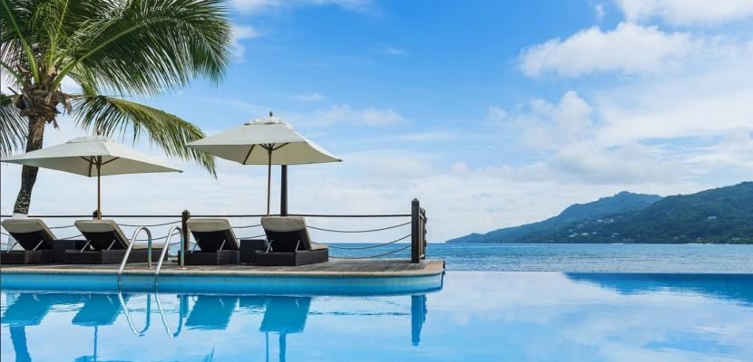Enjoy the picture-perfect view from the infinity pool at Le Meridien Fisherman's Cove in the Seychelles.