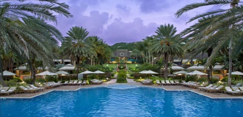 The pool area of the Westin St. John Resort at sunset