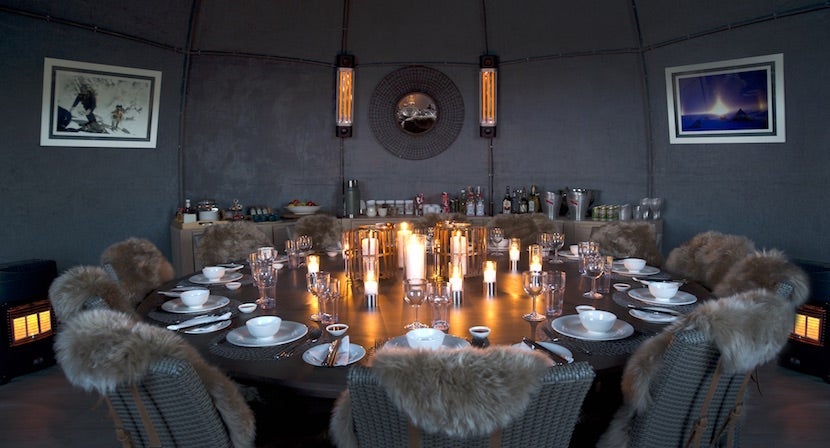 The dining room, complete with fur throws to keep guests warm, recently got an upgrade. Image courtesy of White Desert Antarctica.