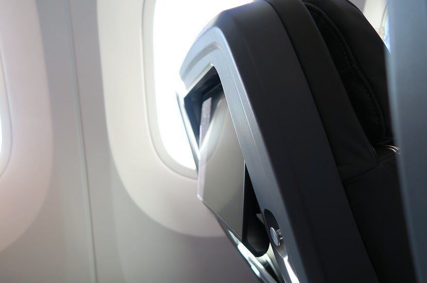 In premium economy, the screens have extra tilt to counter the extra seat recline.