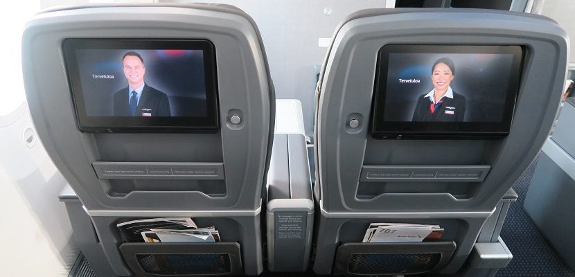 The seat-backs have a storage tray and a seatback pocket.